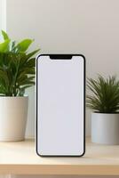 Mockup smartphone with blank screen on table with green plant AI generated photo