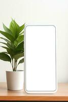 Mockup smartphone with blank screen on table with green plant AI generated photo