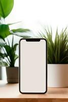 Mockup smartphone with blank screen on table with green plant AI generated photo