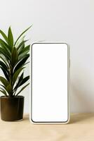 Mockup smartphone with blank screen on table with green plant AI generated photo