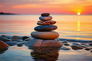 apilar de zen piedras en el playa a puesta de sol. zen concepto ai generado foto