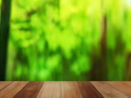 Wooden table on bamboo plant background ai generated photo