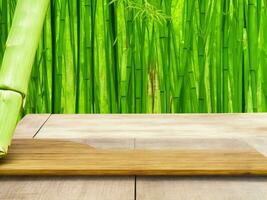 Wooden table on bamboo plant background ai generated photo