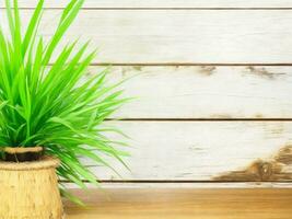 Wooden table on bamboo plant background ai generated photo