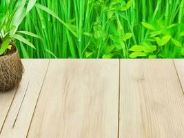 Wooden table on bamboo plant background ai generated photo