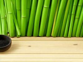 Wooden table on bamboo plant background ai generated photo