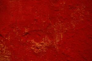 Dark red background texture of a painted wall photo