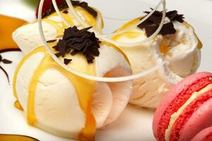 Gourmet vanilla ice cream with macaroons photo