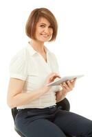 Beautiful smiling businesswoman holding pad photo