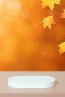 White podium and red-orange maple leaves autumn fall background with bokeh. Mock up for products. photo