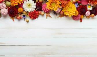 Ai generated Autumn flowers frame on wooden background. Seasonal yellow and red flowers. Autumn background. Space for text. photo