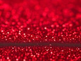 Red christmas glitter background with stars. Festive glowing blurred texture. photo