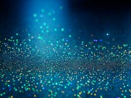 background of abstract glitter lights. blue, gold and black. de focused. banner photo