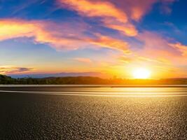 Empty asphalt road and beautiful sky at sunset, panoramic view. photo