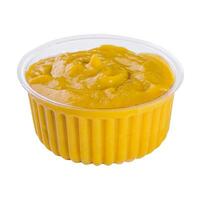 Mustard in small plastick bowl isolated photo