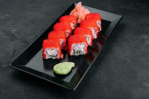 California maki sushi with masago - roll made of crab meat photo