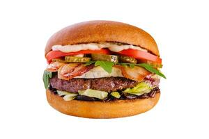 Bacon cheese burger with beef patty tomato cucumber photo