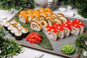 Different kinds of rolls stand on a stone plate photo