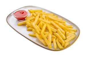 Crispy french fries with ketchup ready to eat photo
