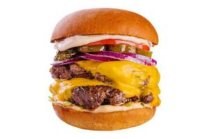 Large cheeseburger with two beef patties grilled photo