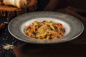 Asian dish glass noodles with vegetables photo