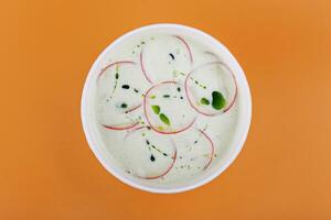 Summer yoghurt cold soup with radish photo