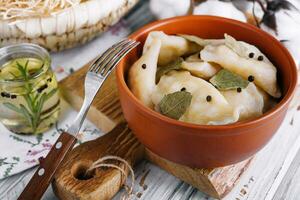 Dumplings with pepper and Bay leaf photo