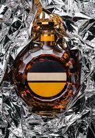 bottle of cognac in foil top view photo