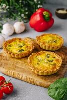 many mini bite size quiche appetizers photo