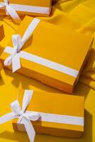 Yellow gifts on a yellow background photo