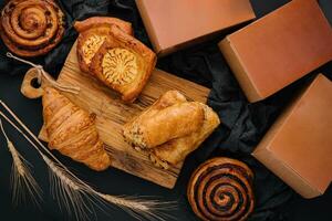different pastries with boxes for delivery photo