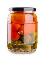 Salted cucumbers and tomatoes, in a glass jar photo