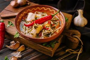 Soup with Chicken Broth with Noodles and Vegetables photo