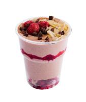 greek yogurt granola with raspberries, chocolate and nuts on white background photo