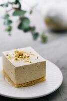 Souffle cake with nuts on plate photo