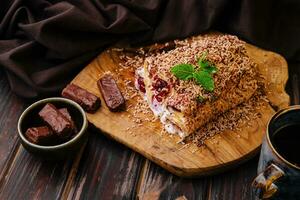 Sour cherry cake with chocolate and cream photo