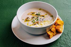 Soup puree with mushrooms and parmesan photo