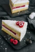 Winter cake with white cream decorated raspberries photo