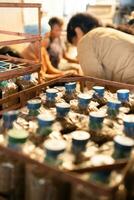 The mushroom lumps in the baskets are packed in bags ready to be filled with leavening agent and taken to the growing house. photo