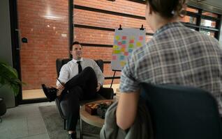 Business people working together in a modern office. Business people discussing business plan. photo