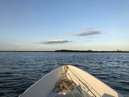 seascape with a fishing boat with fishing rods, fishing, first person view photo