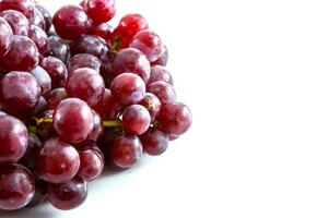 Red grape on white background photo