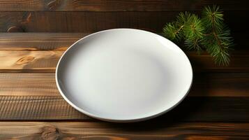 Empty white plate on the table in the kitchen photo