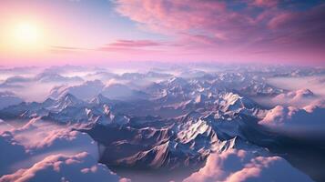 montaña picos con nieve picos con rosado nubes a puesta de sol ver desde encima foto
