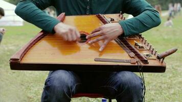 Folk musician playing gusli video