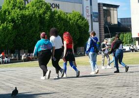 People are Walking at Main Shopping Center of Downtown City Centre of Luton City, England Great Britain UK. Image Captured on June 2nd, 2023 photo