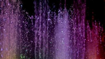 Fountain with color illumination in slow motion video