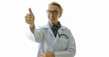 woman doctor with stethoscope in uniform and thumbs up  over background with copy space, medical concept photo