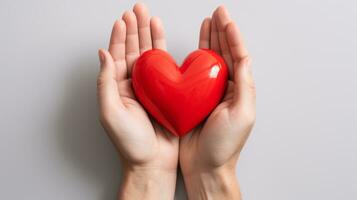 close-up of hands holding a big red heart in the palms generative ai photo