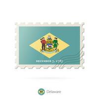 Postage stamp with the image of Delaware state flag. vector